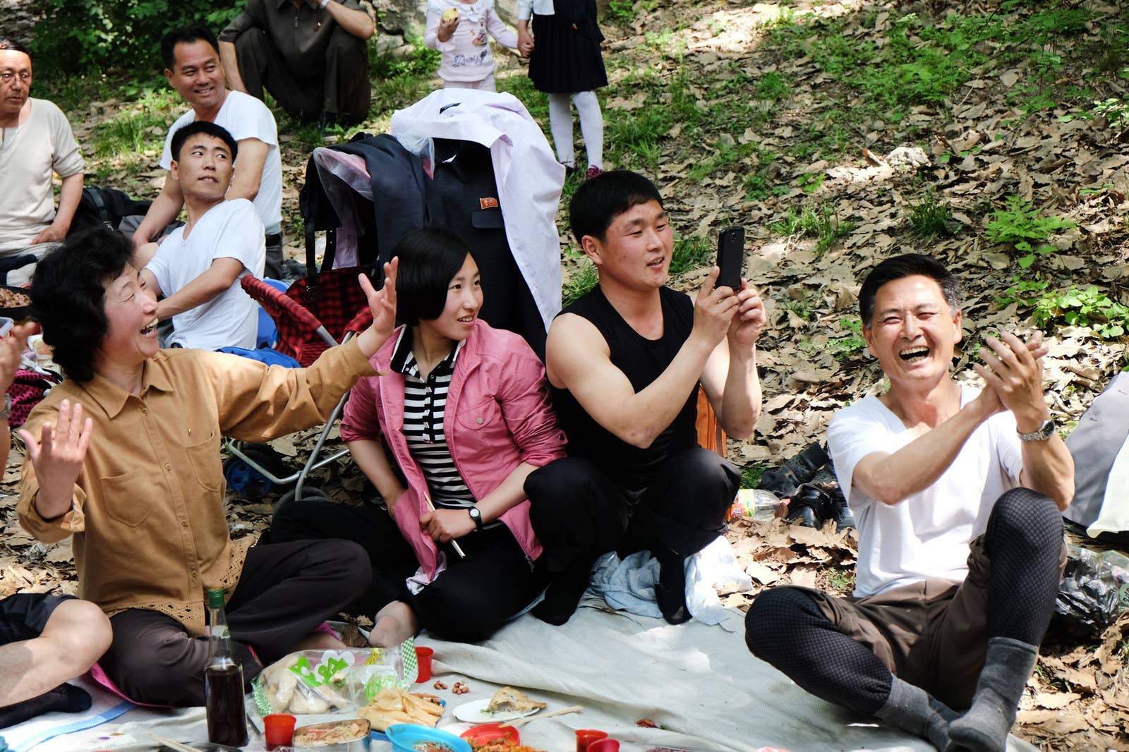 Locals enjoy a picnic on Moran Hill in Pyongyang.