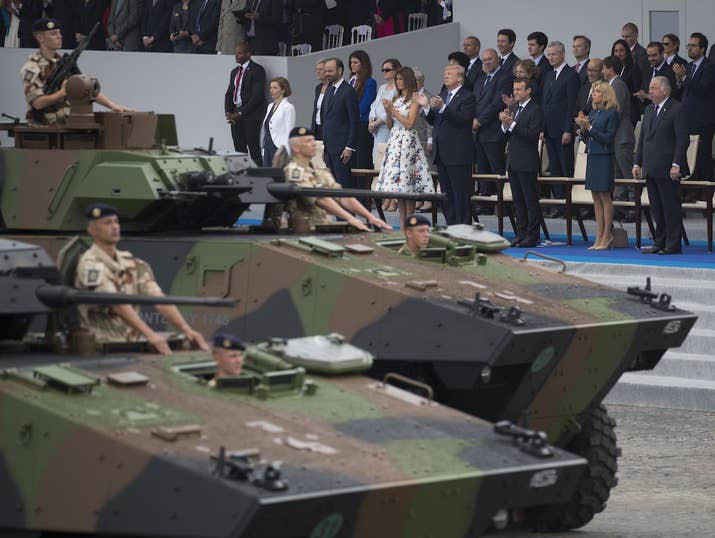 Tanks parade past President Trump, first lady Melania Trump, French President Emmanuel Macron, and his wife, Brigitte Macron, during Bastille Day.