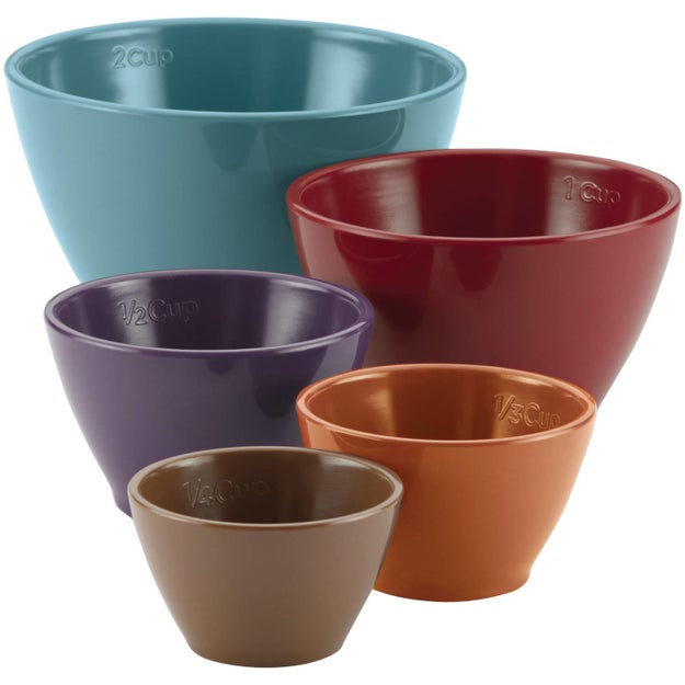 A five-piece set of nesting measuring cups that have raised measurement capacities that won't peel off after repeated washing.