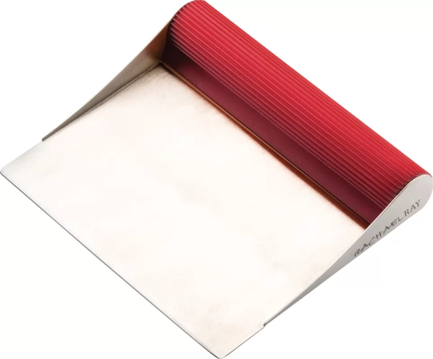 A bench scrape shovel with heavy-duty stainless steel to scoop up prepped veggies like a pro.