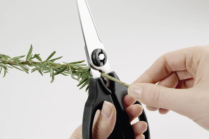 These kitchen shears come apart for easy cleaning!Promising review: "I love these scissors. They are used daily in my kitchen. I love how they open into two pieces for easy cleaning. They cut through everything — chicken bone, plastic packaging, etc., and are great for snipping herbs from my garden. I buy them as wishing-well gifts at bridal showers for everyone I know." —Julie WrightGet them from Amazon or Walmart for $17.95 or from Jet for $17.99.