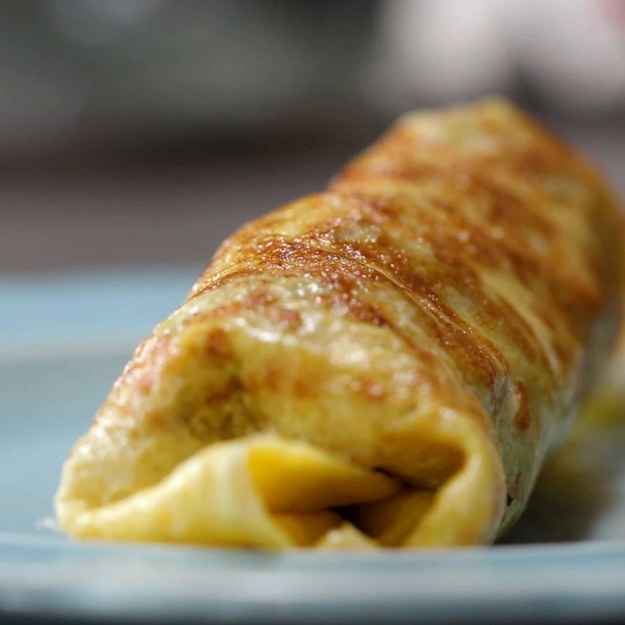 Ham & Cheddar Wrapped Breakfast Burrito1 servingINGREDIENTS2 egg salt, to taste1 tablespoon shredded parmesan cheese½ tablespoon butter3 slices ham2 tablespoons scallion, sliced25 g (¼ cup) shredded cheddar cheesePREPARATION1. In a medium size bowl, whisk the eggs, salt, and Parmesan until well combined.2. In a medium size saucepan over medium-high heat, melt the butter and pour the egg mixture into the pan. Let the egg cook just until it starts to set, then add the ham, scallions, and cheddar cheese in the center of the egg wrap.3. Cover with a lid and cook for another 3 minutes, or until the egg is fully cooked through and the cheese is melted.4. Remove from the pan and fold in the egg wrapâs left and right sides, then roll from the bottom to the top to form a burrito.5. Enjoy!Inspired by:https://mylifecookbook.com/freezable-low-carb-breakfast-burritos-grain-free-nut-free/---Bacon & Sausage Egg Wrapped Breakfast Burrito1 servingINGREDIENTS2 egg salt, to taste1 tablespoon shredded parmesan cheese½ tablespoon butter25 g (¼ cup) shredded cheddar cheese50 g (¼ cup) breakfast potato, cooked35 g (¼ cup) sausage, cooked1 ½ slices bacon, cookedPREPARATION1. In a medium size bowl, whisk together the eggs, salt, and Parmesan until well combined.2. In a medium size saucepan over medium-high heat, melt the butter and pour the egg mixture into the pan. Let the egg cook just until it starts to set, then add the cheddar cheese, potatoes, sausage, and bacon to the center of the egg wrap.3. Cover with a lid and cook for another 3 minutes, or until the egg is fully cooked through and the cheese is melted.4. Remove from the pan and fold in the egg wrapâs left and right sides, then roll from the bottom to the top to form a burrito.5. Enjoy!---Avocado & Black Bean Egg Wrapped Breakfast Burrito1 servingINGREDIENTS2 egg salt, to taste1 tablespoon shredded parmesan cheese½ tablespoon butter25 g (¼ cup) shredded cheddar cheese40 g (¼ cup) black bean40 g (¼ cup) onion, cooked25 g (¼ cup) bell pepper, cooked3 slices avocadoPREPARATION1. In a medium size bowl, whisk the eggs, salt, and Parmesan until well combined.2. In a medium size saucepan over medium-high heat, melt the butter and pour the egg mixture into the pan. Let the egg cook just until it starts to set, then add the cheddar cheese, black beans, onions, and peppers to the center of the egg wrap.3. Cover with a lid and cook for another 3 minutes, or until the egg is fully cooked through and the cheese is melted. Add the avocado slices.4. Add avocados and remove from the pan. Fold in the egg wrapâs left and right sides, then roll from the bottom to the top to form a burrito.5. Enjoy!