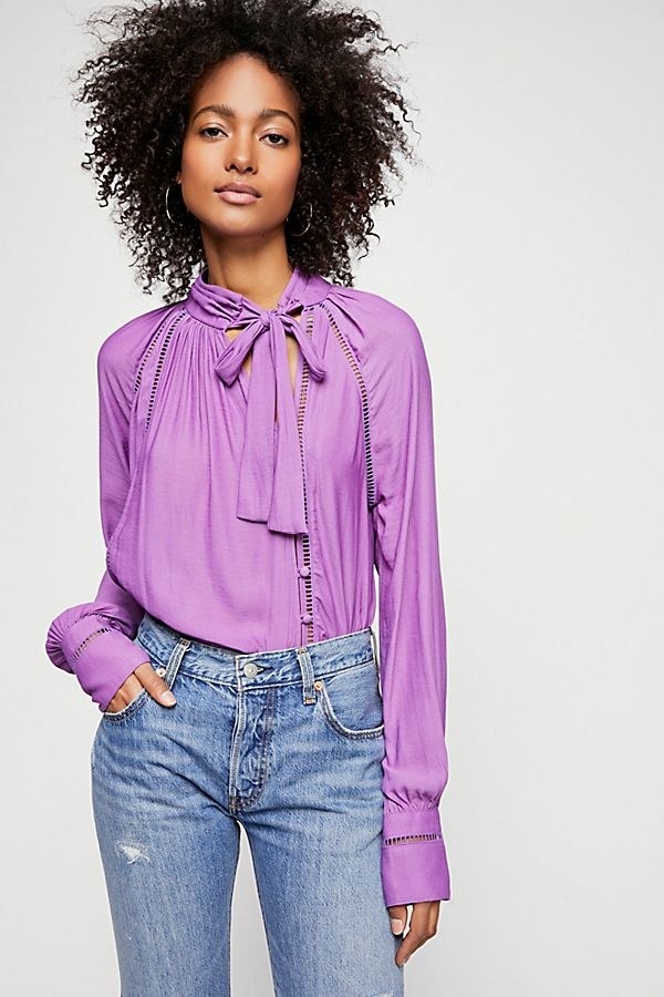 Get it from Free People for $88 (available in sizes XS–L and six colors).Promising review: "This soft dreamy blouse is perfection! I own it in white and am now buying it in black. It’s so effortless, comfortable, and chic! I wear it with the FP nude brami underneath. The soft material hangs beautifully and doesn’t wrinkle very much I ordered my usual FP size and it’s a little bit roomy. This blouse is perfect for dressing up, down, layering — it’s perfect!" —Kelseylocurtis