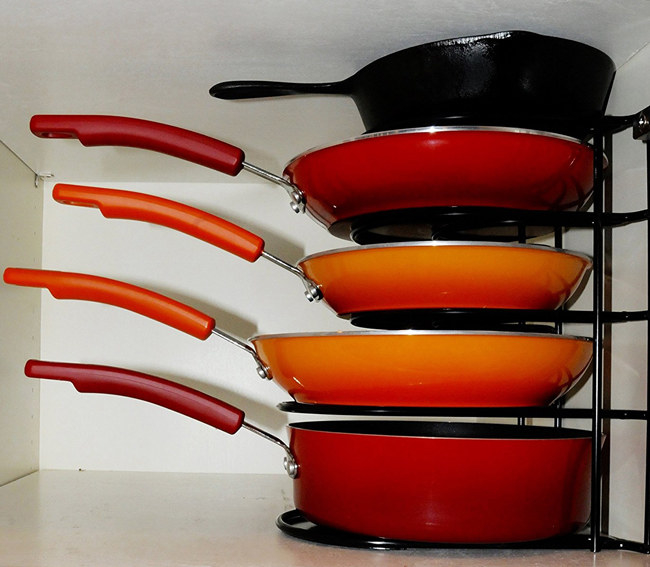 The organizer can store pans either horizontally or vertically, and works well with pots, pans, griddles, baking dishes, serving trays, and most lids. Promising review: “My wife and I love this thing even more than we thought we would. MY LONG-STANDING frustration of disorganized pot is over! One really neat thing is that some of the pot lids actually fit in the pots and are storable as well. The versatility of this organizer is awesome because it can be used on a kitchen counter or in a cabinet — horizontally or vertically. Additionally, it comes with two screws and plastic wall anchors to secure it to a wall or cabinet board, if you want to secure it against shifting. If you are looking for a heavy-duty pan organizer that is solid and reliable, this is it.” —Jonathan
Price: $29.97
