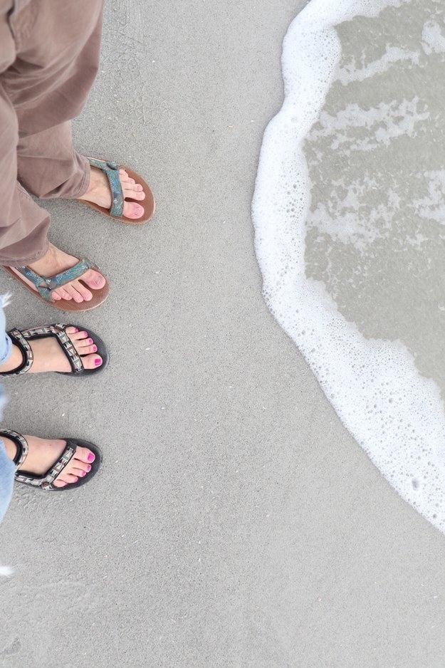 two readers wearing the black foam footbed ankle-strap sandals with strap connecting top toestrap to ankestrap