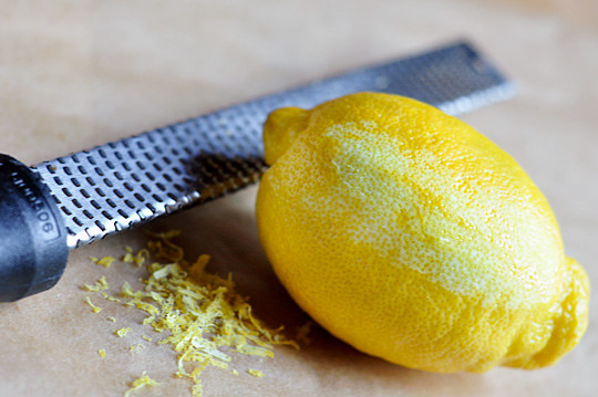 When zesting a lemon, use a microplane to remove only the top layer of skin, and try not to get too much of the white stuff (it's called the pith). You get all the delicate citrus-y flavor, with none of the bitterness!