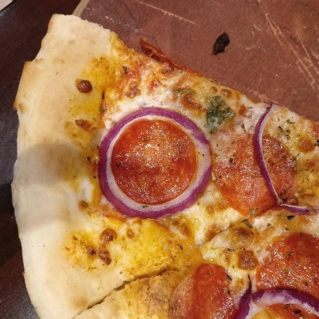 Look at how perfectly that pepperoni fits inside that onion. FATE.