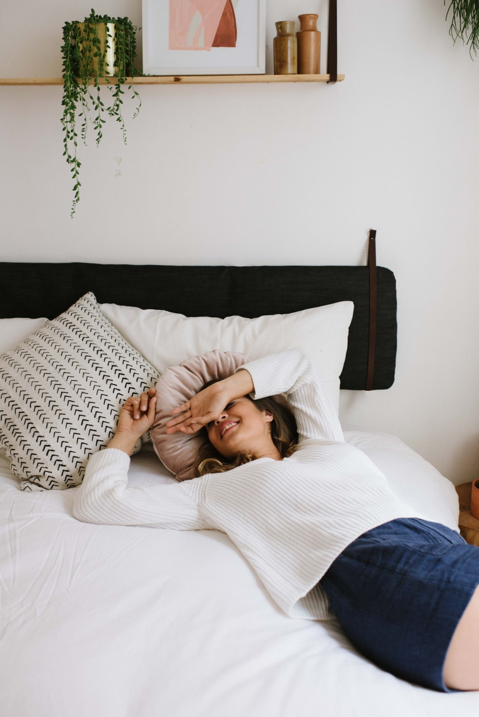 a fake headboard on a bed