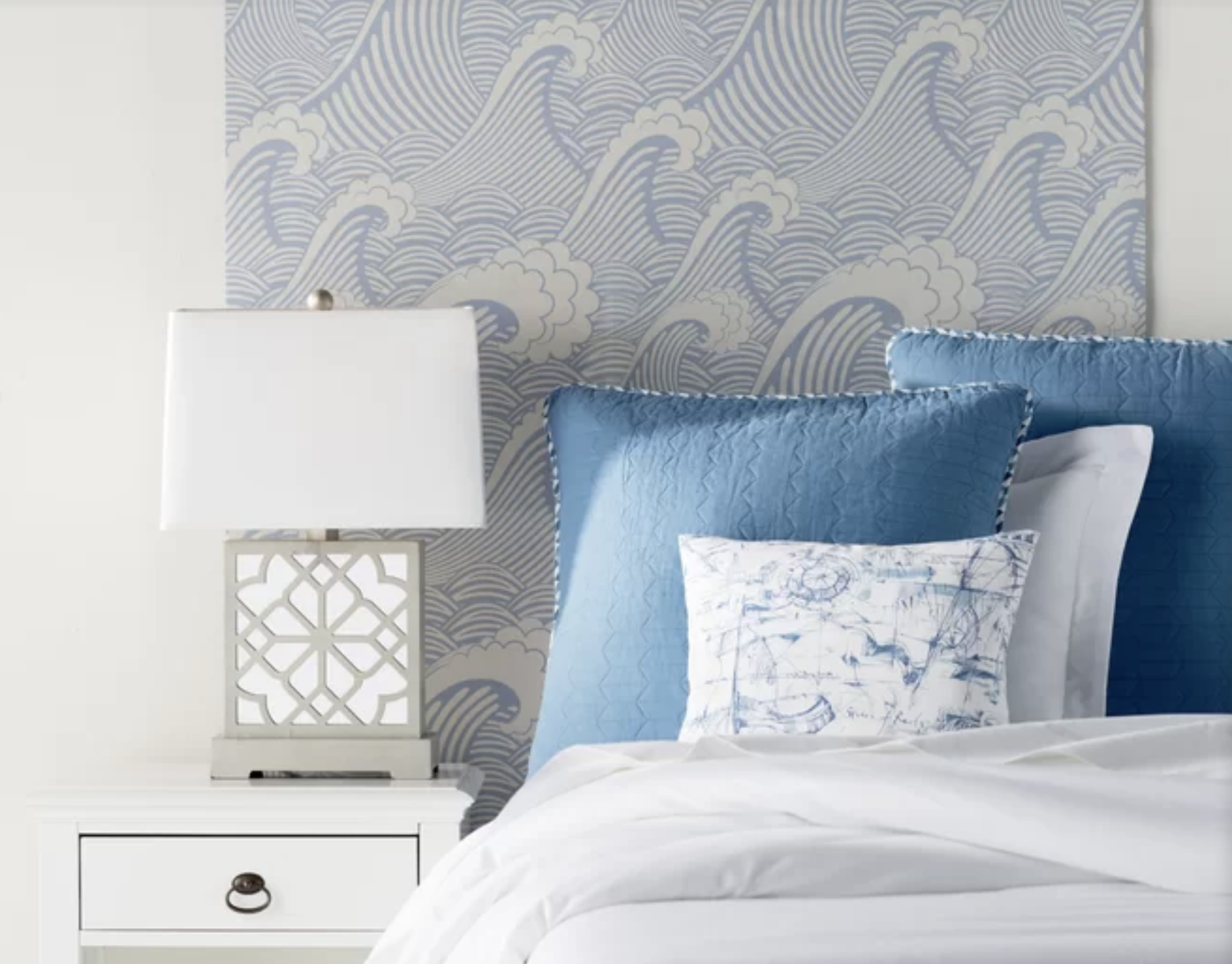 wave-patterned wallpaper in a bedroom