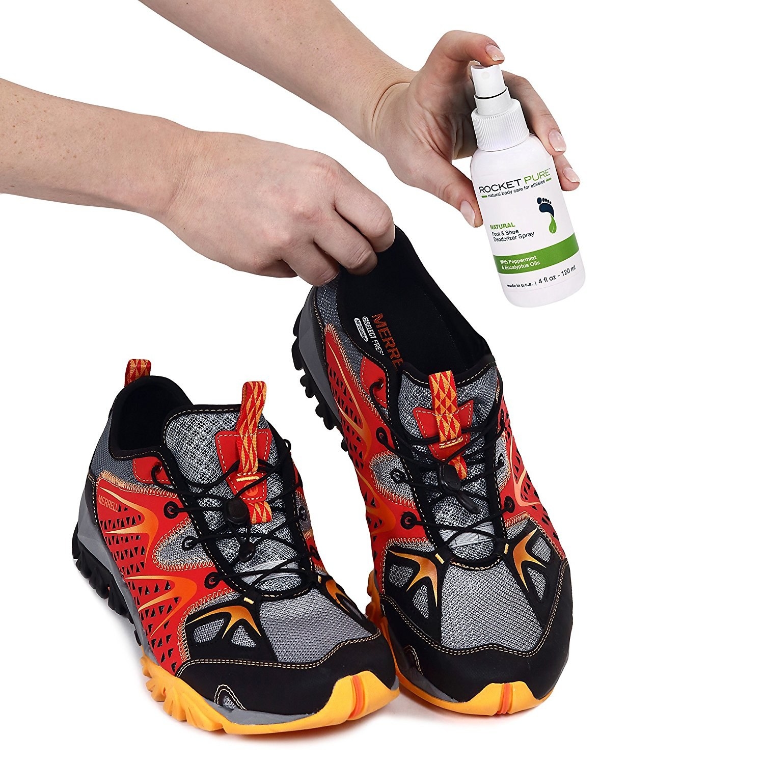 Person spraying product into sneakers 