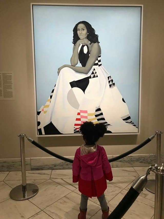 This Photo Of A Little Girl Staring At Michelle Obama S Portrait