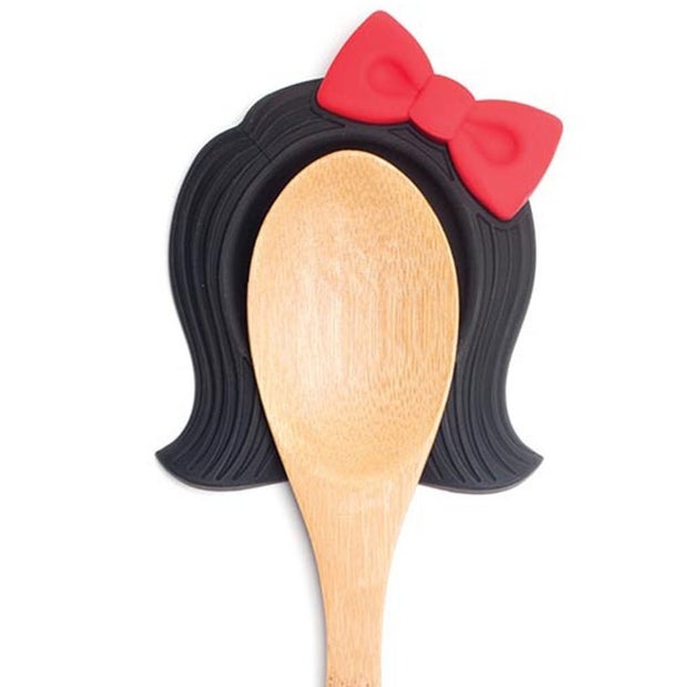 A silicone spoon rest with the magic ability to make a utensil look like Linda Belcher from Bob's Burgers (if Linda wore a bow, that is).