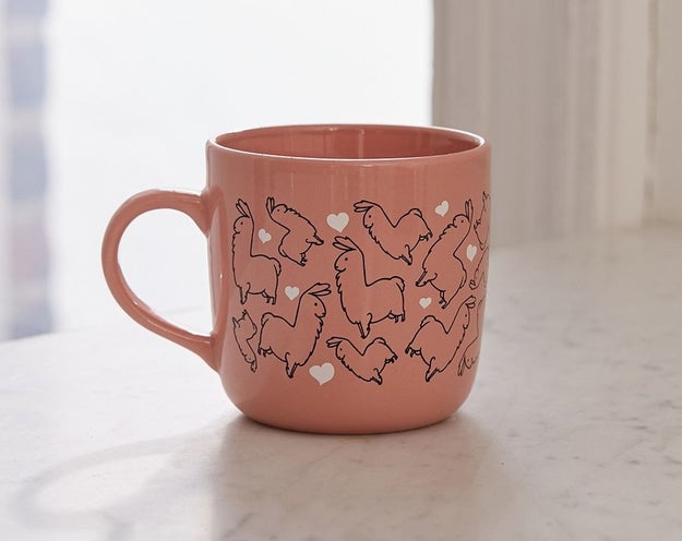 A ceramic coffee mug because coffee is even more enjoyable when it's served with a side of llamas.