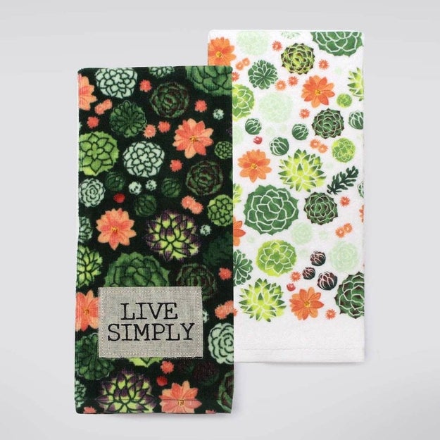 A pair of cotton kitchen towels to make doing the dishes ~succ~ a little less.