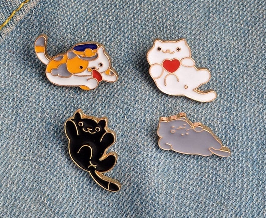 These pins come in a velvet pouch with extra pin backs!Promising review: "These are adorable! They're quality and super fun. I gave one to each of my friends! A little smaller than expected but still well worth it in my opinion!" —Jem CalcutGet a four-pack from Amazon for $7.99.