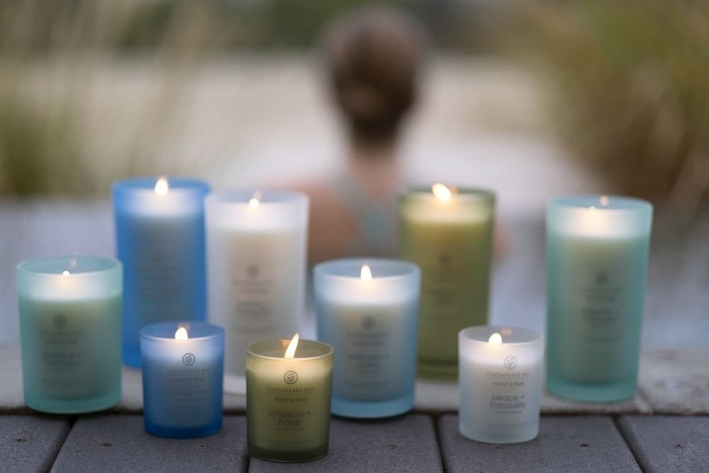 candles in various sizes and frosted colored glass