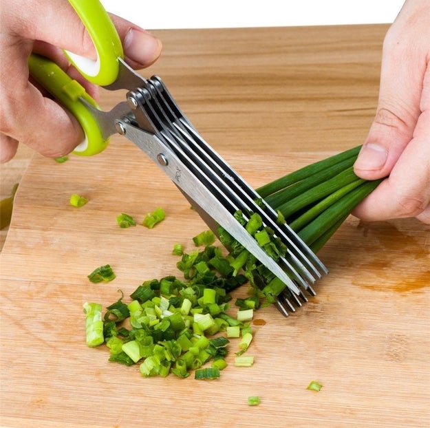 ~Cut~ painstaking prep sessions in half by using a pair of five-blade stainless steel scissors to efficiently cut greens and herbs. You can even do this while watching Netflix, because it requires exactly zero thought.