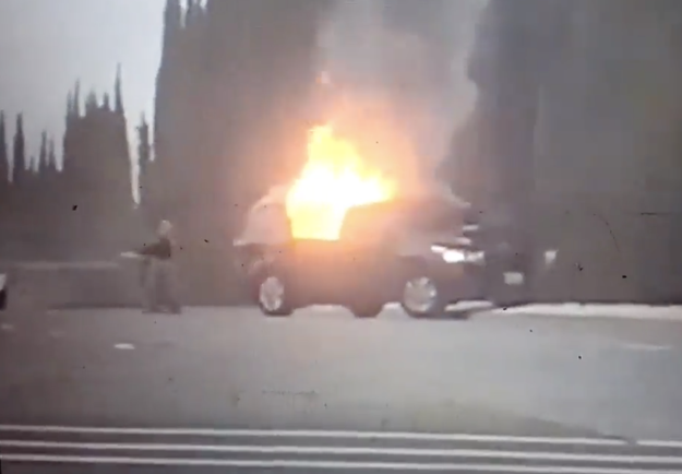 A vehicle burst into flames Wednesday shortly after breaching the main gate at a Northern California air force base, killing the driver, officials said.