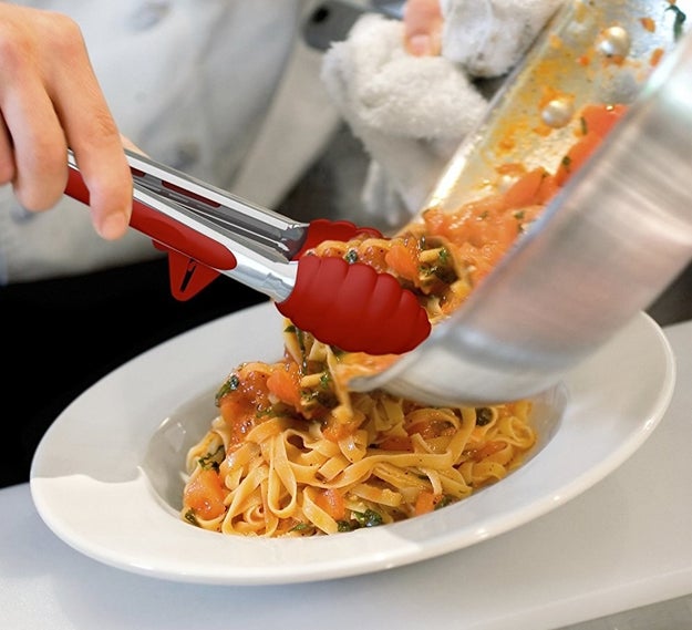 Dodge splattering by using a pair of non-stick silicone tongs that have their own stands so food residue never touches your countertops. Even the messiest of us really can't screw this up!