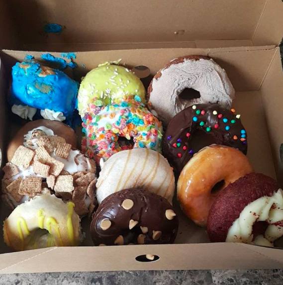 Bring a totally normal box of donuts or another delicious food in to work, and leave it out with a sign that says "April Fool's!" Then watch everyone try to figure out what you did to it.