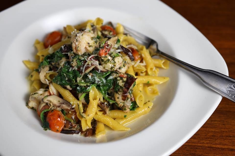 Satisfy your carb cravings with the Shrimp Gargenelli. The perfectly al dente garganelli pasta is prepared with plump shrimp with roasted tomato, baby spinach, mushrooms, and basil with shavings of parmesan cheese.