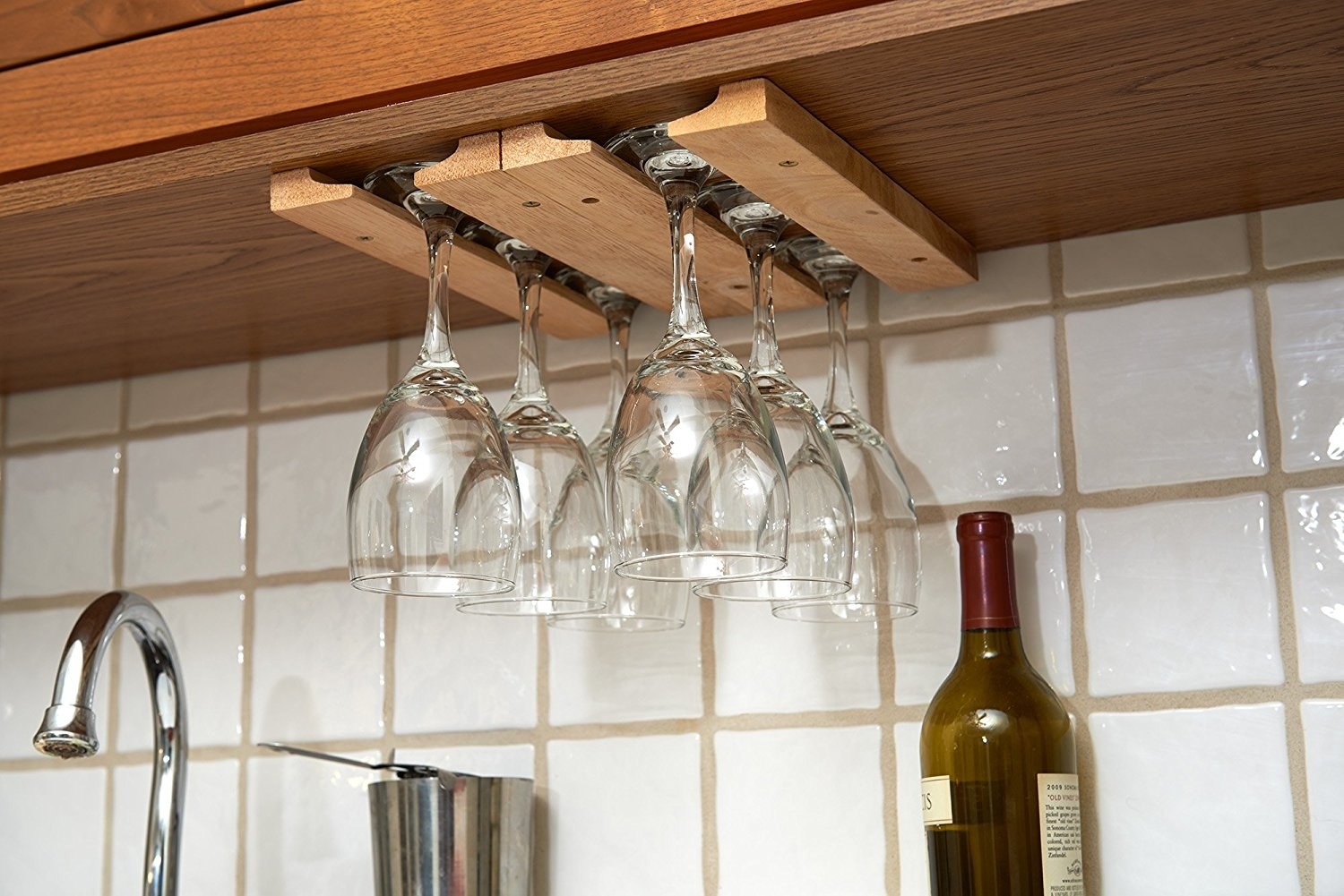 Promising review: "I turned an entertainment center into a beautiful liquor cabinet. These are perfect and easy to mount. You just have to be sure the spacing is right for the size of the base of your wine glasses." —Shirley A. VierthPrice: $15.99