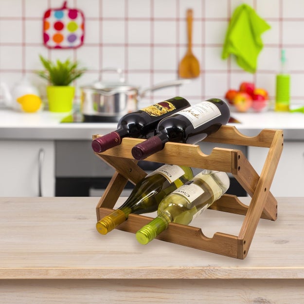 A charming foldable bamboo wine rack to prove to your guests that you've got this whole adulting thing down pat.