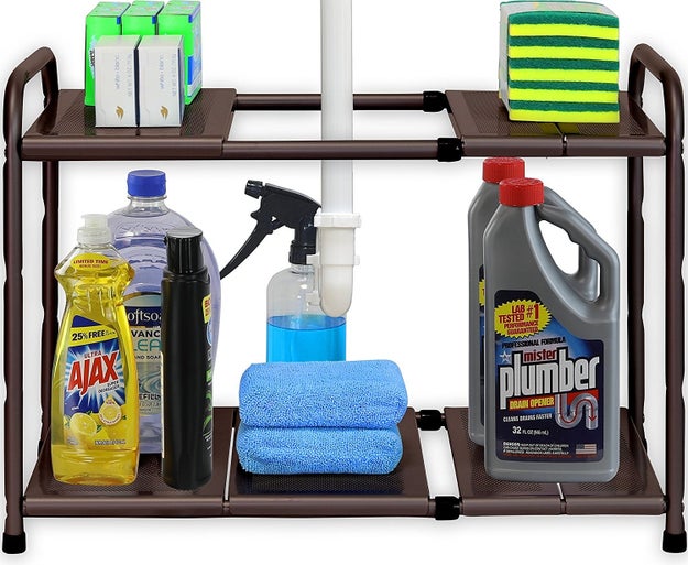 An expandable shelf to organize all that crap you've got strewn about like a tornado hit under your sink.