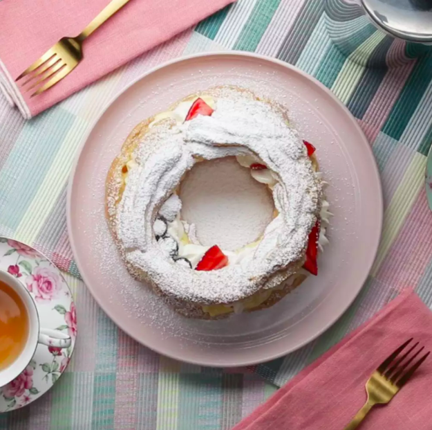 A Berries &amp; Cream Puff Ring that'll be camera-ready on a beautiful flat-lay table setting. Psst, we won't tell you used a mixing bowl in the microwave to make the custard!!!