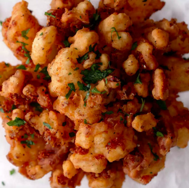 A Cheese-Stuffed Blooming Onion to satisfy your Outback craving and then some. You need is a Dutch oven and a hankering for something cheesy, fried, and delicious.