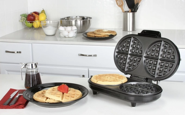 A double waffle iron so you and your boo can enjoy brunch at home *together* — not one sadly waiting for the other's waffle to get done while their own gets cold.