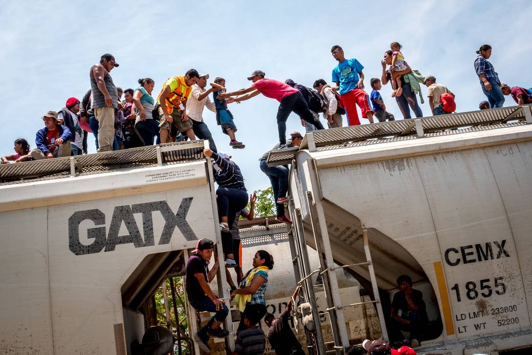 Migrants practice boarding "La Bestia," the infamously dangerous train that will carry them toward the US border.