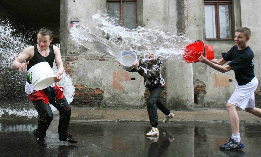 Pouring water on one another is a Polish Easter tradition called Śmigus-dyngus. The day is dominated by public water fights and everyone is given carte blanche to drench anyone they see with water.