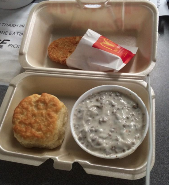 Biscuits and gravy in a takeout container