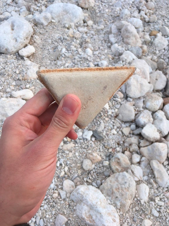 This rock that looks like a crustless sandwich cut with the utmost precision.