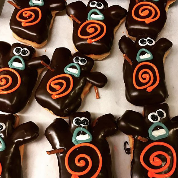 Pastries in the form of frosted voodoo dolls