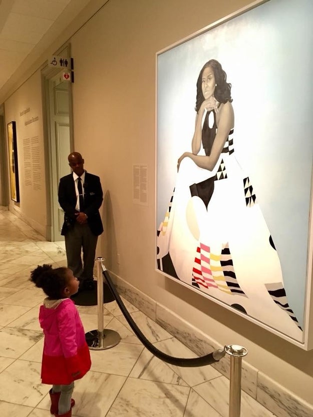 If you were on the internet the law few days, chances are you saw this beautiful photograph of a little girl staring up in wonder at the official portrait of former First Lady Michelle Obama.