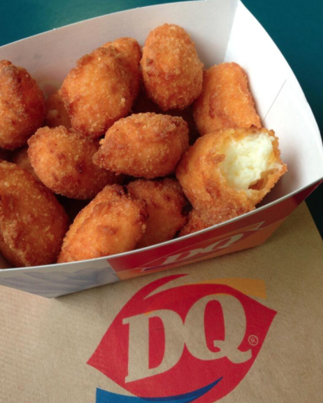 Close-up of cheese curds in a takeout basket
