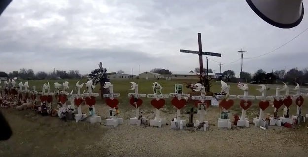 In a video posted Feb. 2, Ussery stands in front of a makeshift memorial outside the church and uses a bullhorn to offer $100,000 for "proof of death for any of the 26 victims of the fake hoax shooting."