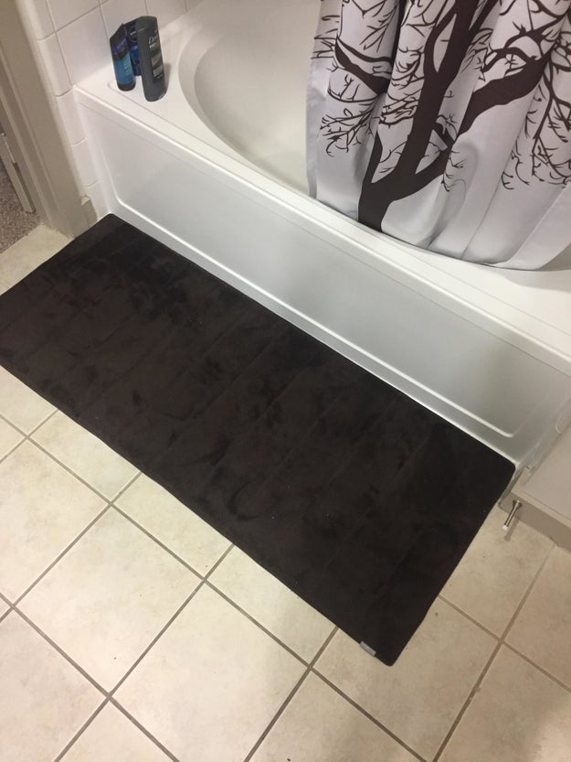 Is that custom? Are you a celebrity? Did you pay a million dollars for a bath mat that fits perfectly in your lil' tub nook?