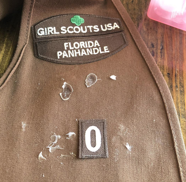 This mom who learned the hard way that you can't hot glue patches on a Girl Scout vest; you have to sew them.