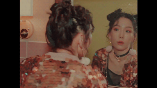 Everyone's killing it in the "All Night" music video — CC: Sooyoung's glittery striped jumpsuit and Stephanie's (FKA Tiffany) sparkly mini and silky robe.