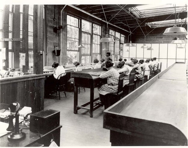 During World War I, The United States Radium Corporation set up a watch factory in Orange, New Jersey. Many of their employees were young women, who painted the watch faces and tiny dials with glowing radium paint.