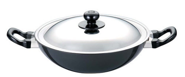 A round bottom pan with a lid so you can create non-stick masterpieces without all the splatter.