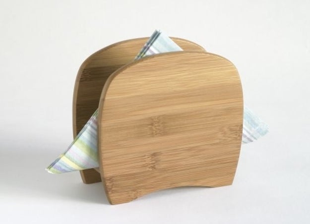 A convenient and sleek napkin holder you woodn't want to have a big family dinner without.