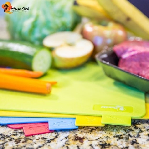 A set of four reversible chopping boards to offer a more organized way of keeping track of which foods you cut on which surfaces!