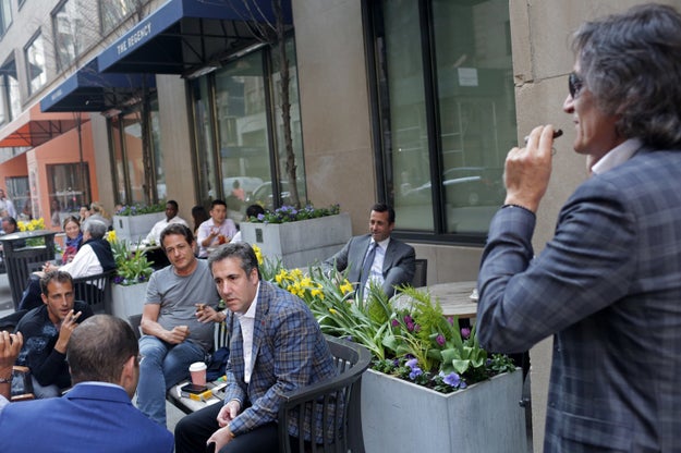 Also, while the court hearing was happening, Cohen was sitting outside his hotel with his pals.