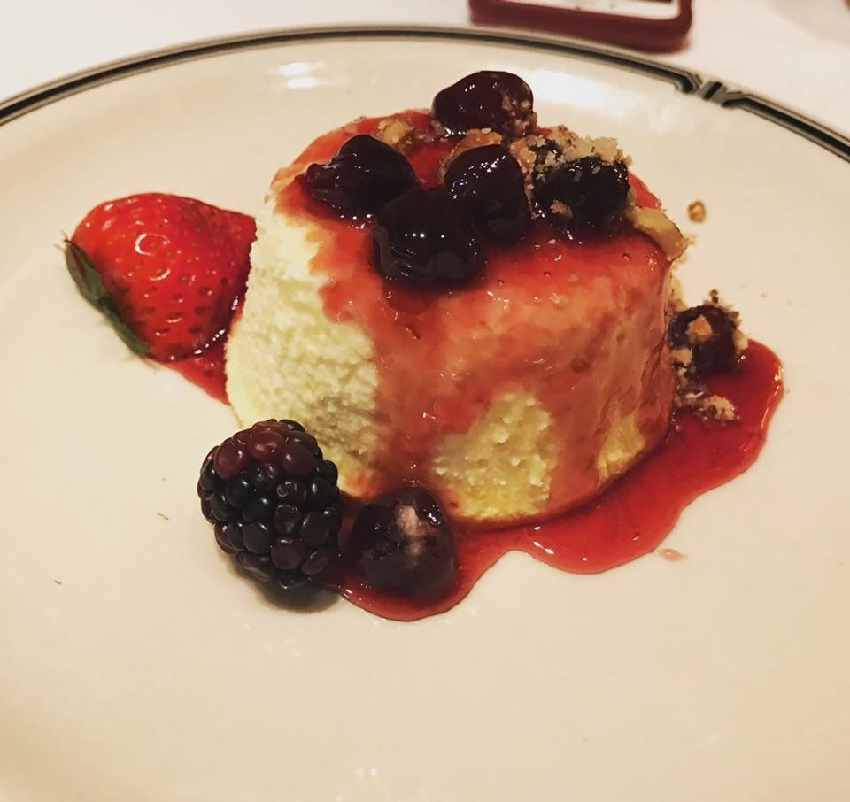 Think of this Athenian yogurt cake as the fluffiest, most moist cheesecake you will ever have. The cake is topped with a drizzle of berry sauce and chewy dried cherries, blackberries, strawberries, and crunchy walnuts.