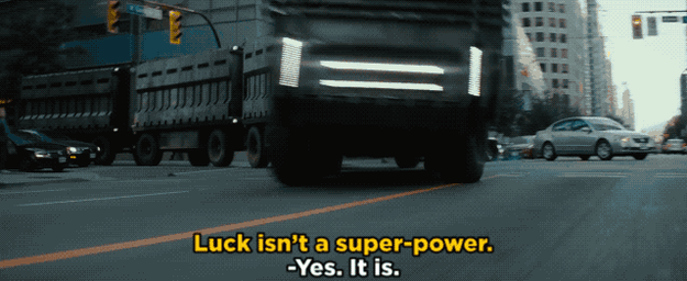 Scene from Deadpool 2, Domino dodges a falling car, captioned 'luck isn't a super power' 'yes, it is'