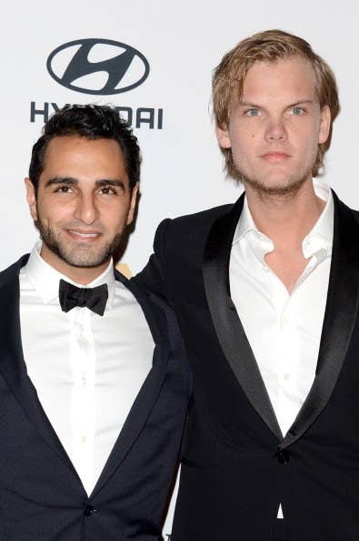 Here He Is With His Former Manager Ash Pournouri At A Pre-Grammys Gala In 2013.